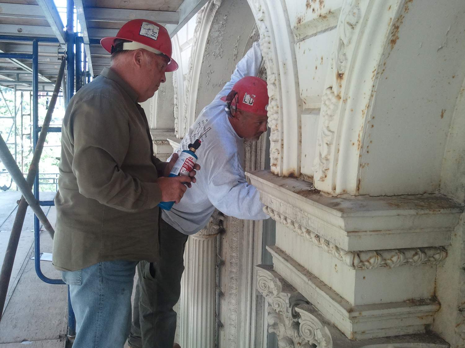 Iron Block stone restoration - arched-window-surrounds-iron-block